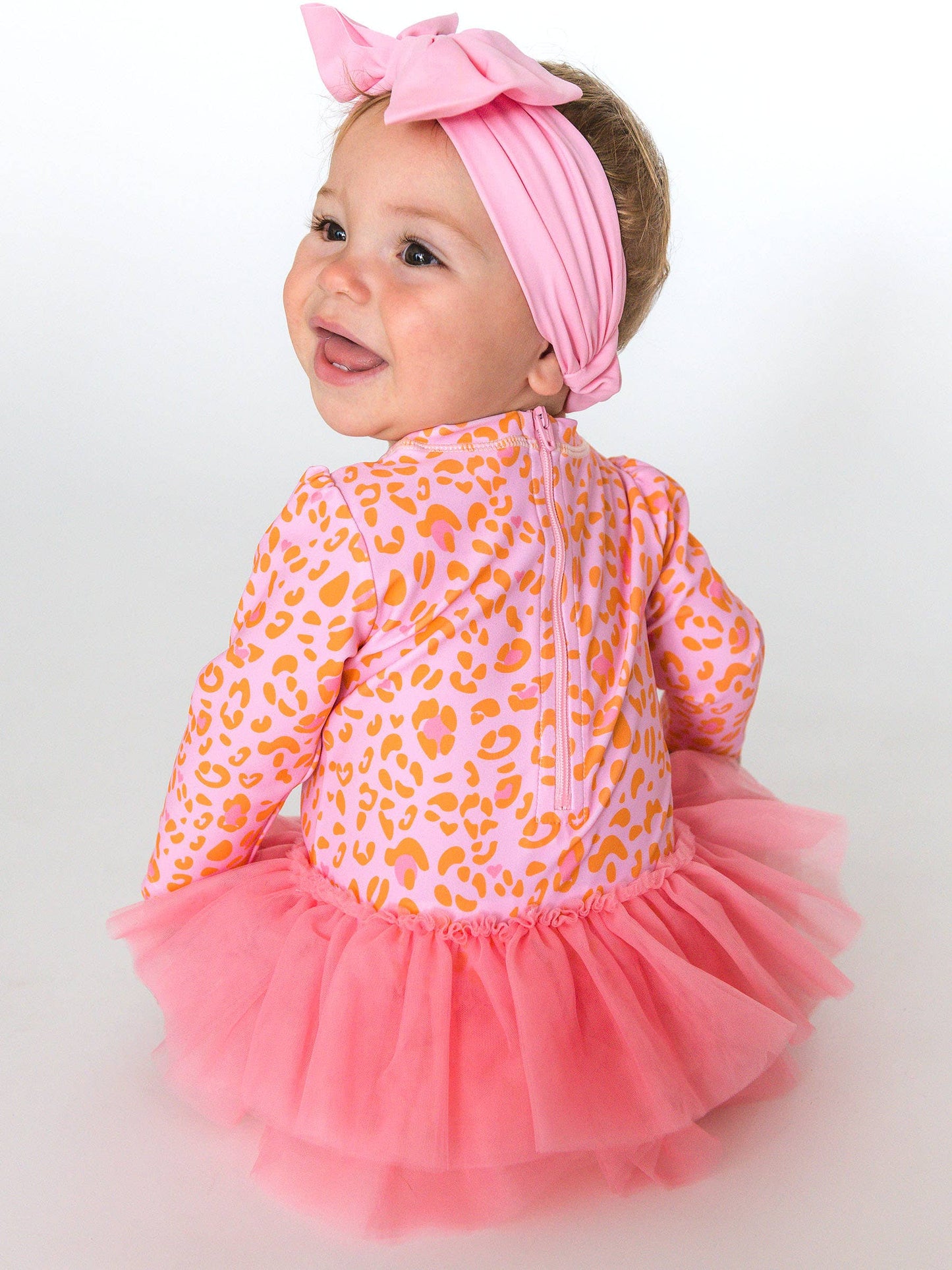 RuffleButts + RuggedButts - Baby Girls Pink Leopard Tulle Skirted One Piece Rash Guard Swimsuit